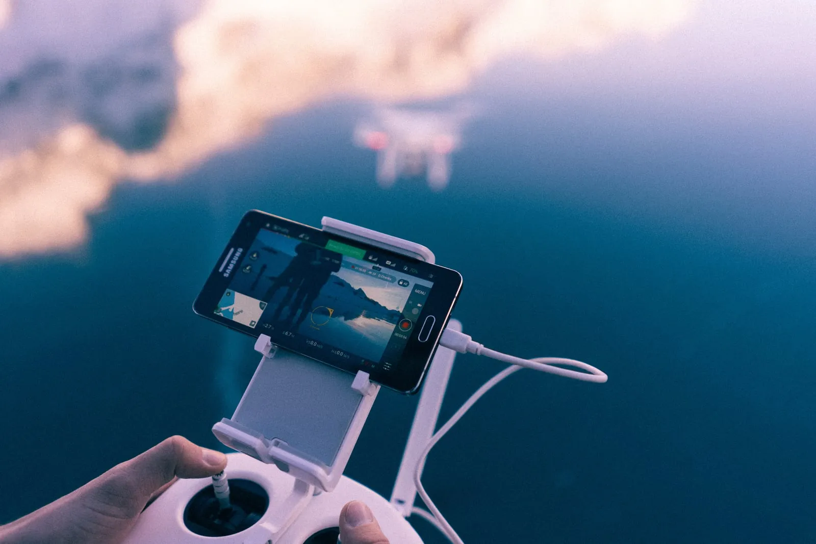Drone controller showing a live aerial view
